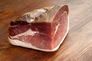 real parma ham over ancient wood table
