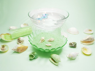 spa candles sea shells and salt