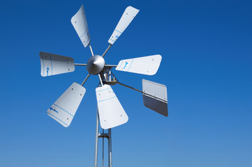 Wind turbine, on blue background