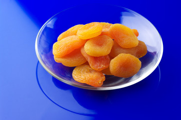 Dried apricots on plate