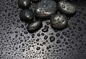 black stones with water drops