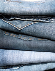 Stack of blue jeans