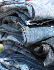 Stack of blue jeans