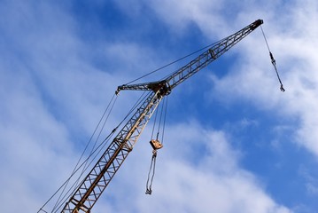 construction lifting crane on a sky background