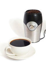 cup of black coffee, electric coffee grinder
