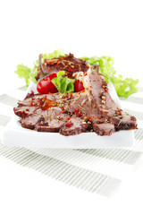 roast meat slices on tissue