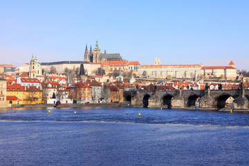 The colorful Prague gothic Castle with the Charles Bridge