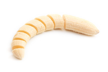 Freshly sliced banana on a white background.