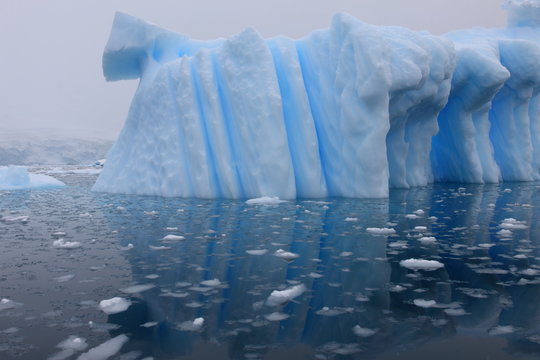 Iceberg and azure water in Antarctica