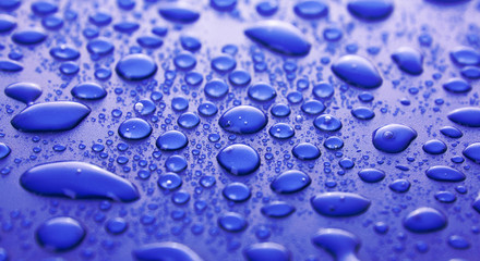 Water drops background with big and small drops