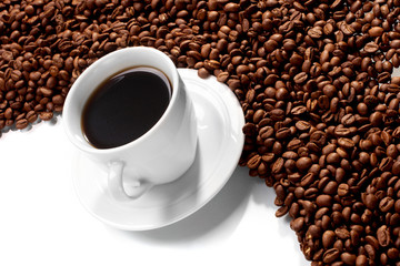Cup with coffee, costing on coffee grain