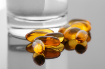 Capsules and water close-up