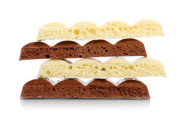 Stack of brown and white porous chocolate