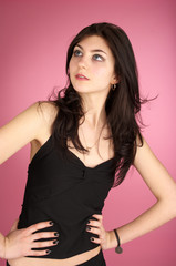 Fototapeta premium Beautiful fashion girl over pink