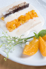 Chocolate biscuit with ice-cream and peaches