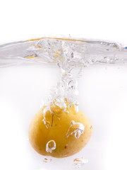 Fruits falling into the water