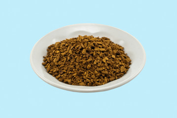 Saucer with soluble coffee
