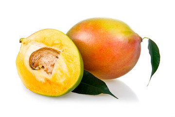 Ripe mango fruits with leaves isolated