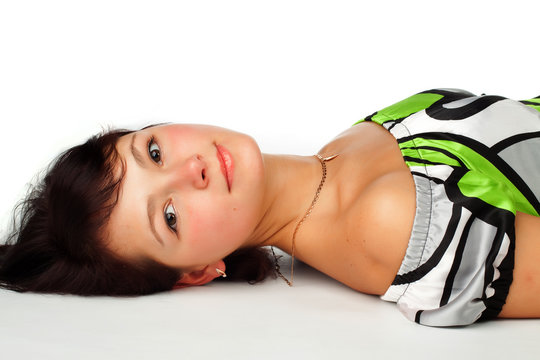 beautiful young woman lying on the floor