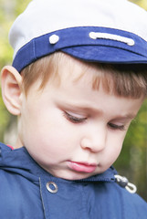 portrait of child in casual clothes in autumn time