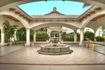 Fototapeta premium The beautiful architecture of a huge gallery with a fountain