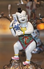 Smiling Chinese statuette