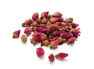 Natural dried rose tea isolated on white background