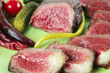 meat and vegetables with peppers
