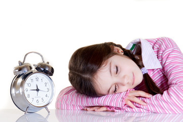 sleeping girl with alarm clock