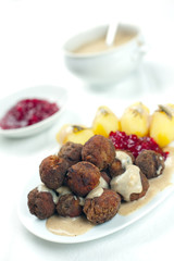 Sweedish Kottbullar meatball with brunsas sauce, boiled potatoes