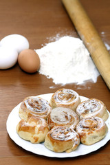 eggs, flour and cakes on the plate