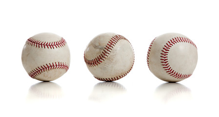 Three baseballs on white background