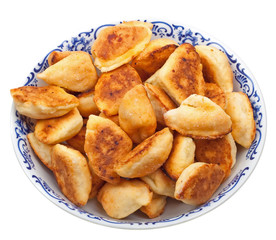 Close-up russian bread loaf on a plate on white