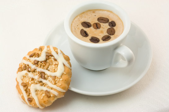 Cup of cappuccino and cookies