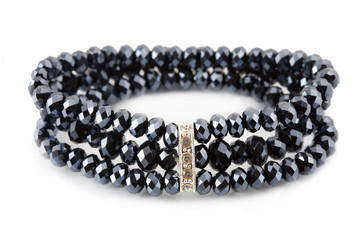black bracelet on white