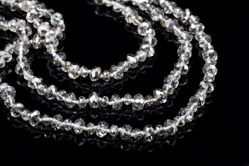 silver beads on black