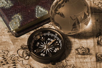 Compass on the old map