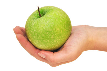 grüner Apfel in der Hand