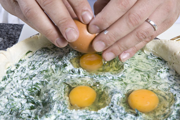 preparing Easter pie. Eggs in stuffing