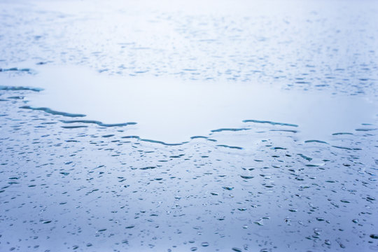 Wet glass surface