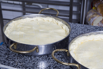 preparing easter pie with spinach