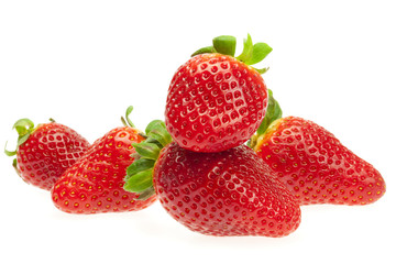 juicy strawberries isolated on white