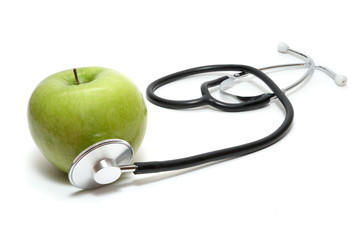 Stethoscope and apple patient (allegorical). Isolated on the whi