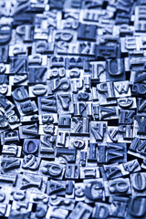 A mix of vintage letterpress characters