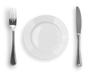 Knife, white plate and fork isolated