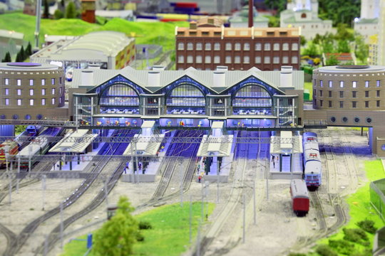 model of railroad station. railroad, humans and buildings