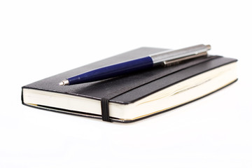 notebook with pen
