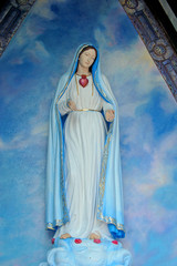 holy virgin mary in a blue chapel - obrazy, fototapety, plakaty