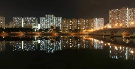 Foto op Plexiglas Buildings near river © leungchopan
