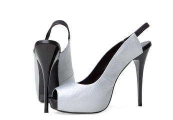 Pair of female shoes on a high heels